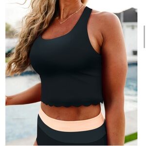 Black tankini with scalloped detail